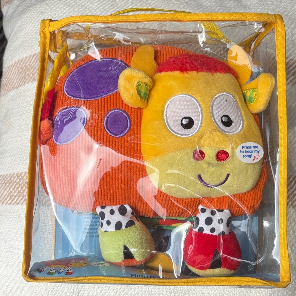 Plush Musical Cow Toy - Orange Yellow with Purple Spots